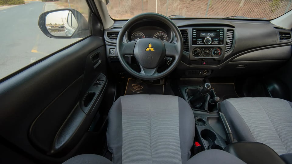 Used 2020 Mitsubishi L200 GLX Double Cabin White – Steering Wheel & Instrument Cluster at First Choice Cars Sharjah