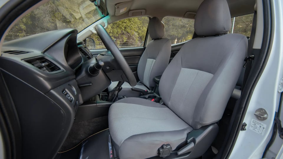 Used 2020 Mitsubishi L200 GLX Double Cabin White – Front Driver Side Cabin View at First Choice Cars Sharjah