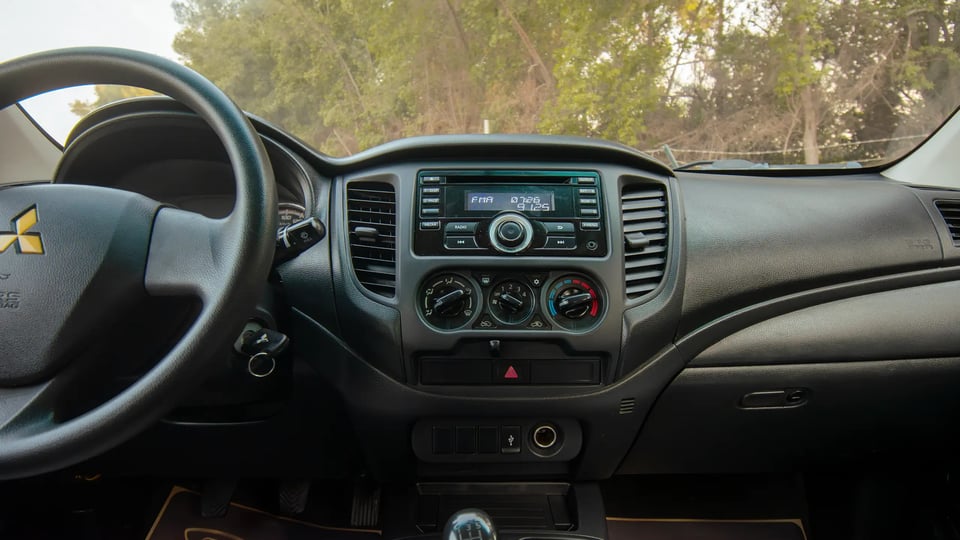 Used 2020 Mitsubishi L200 GLX Double Cabin White – Infotainment / Touchscreen System at First Choice Cars Sharjah