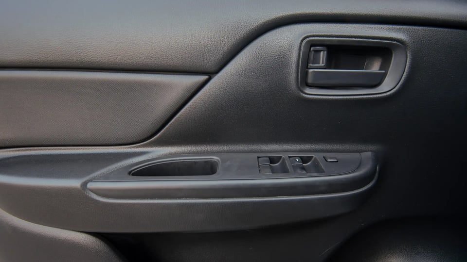 Used 2020 Mitsubishi L200 GLX Double Cabin White – Driver Door Panel Full View at First Choice Cars Sharjah