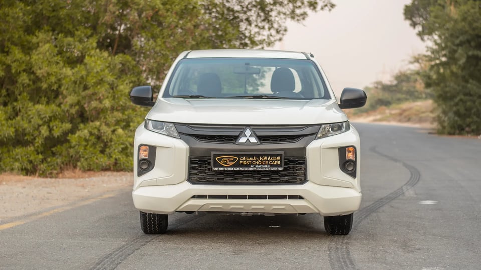 Used 2021 Mitsubishi L200 GL Double Cabin in White – Front View for Sale at First Choice Cars Dubai Sharjah