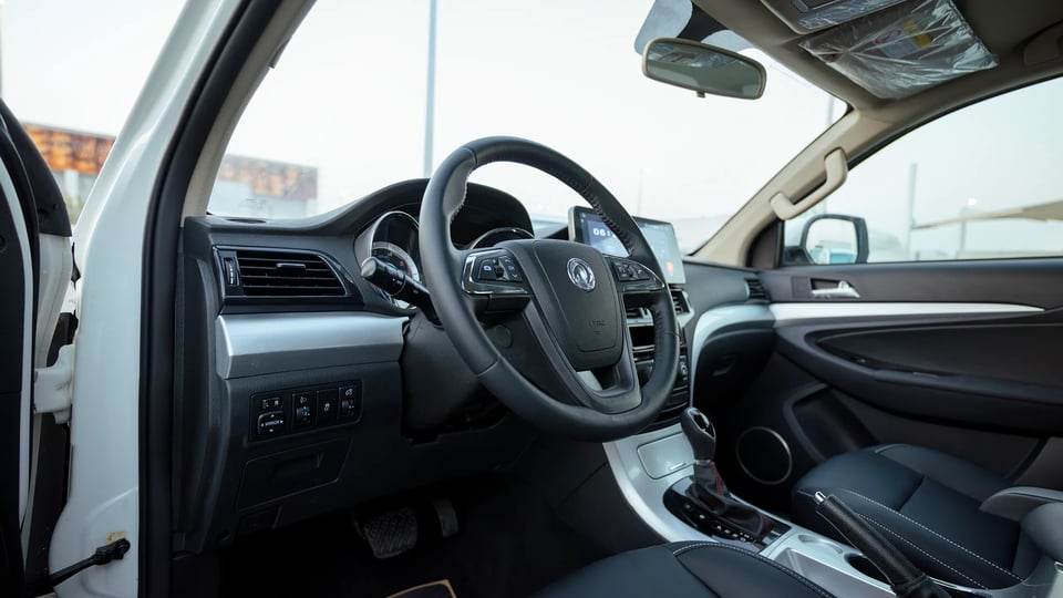 Used 2025 Dongfeng Rich 6 Double Cabin in White – Driver Side Dashboard & Steering View for Sale at First Choice Cars Dubai Sharjah