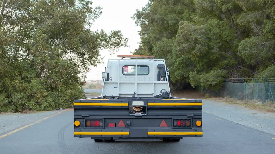 Used 2017 Isuzu NPR Recovery in White – Back/Rear View for Sale at First Choice Cars Dubai Sharjah