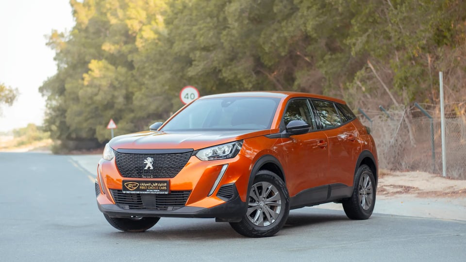 Used 2023 Peugeot 2008 Active in Orange – Left Front Diagonal (45°) View for Sale at First Choice Cars Dubai Sharjah