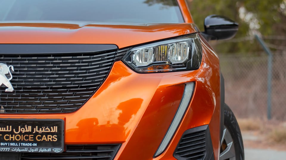 Used 2023 Peugeot 2008 Active in Orange – Headlight Close-up for Sale at First Choice Cars Dubai Sharjah
