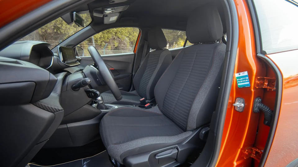 Used 2023 Peugeot 2008 Active in Orange – Front Driver Side Cabin View for Sale at First Choice Cars Dubai Sharjah