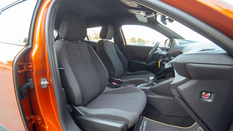 Used 2023 Peugeot 2008 Active in Orange – Front Passenger Side Cabin View for Sale at First Choice Cars Dubai Sharjah