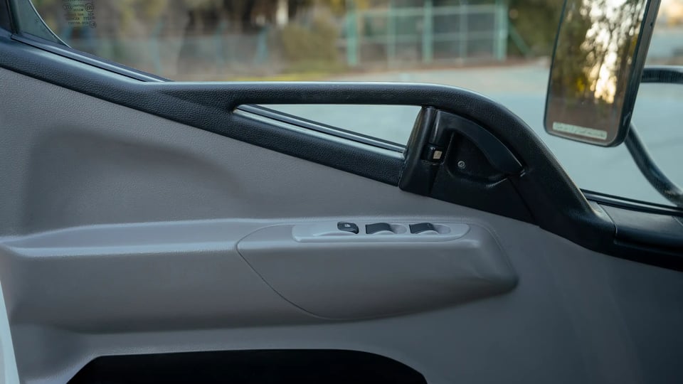 Used 2017 Mitsubishi Canter Chiller Box in White – Driver Door Panel Full View for Sale at First Choice Cars Dubai Sharjah