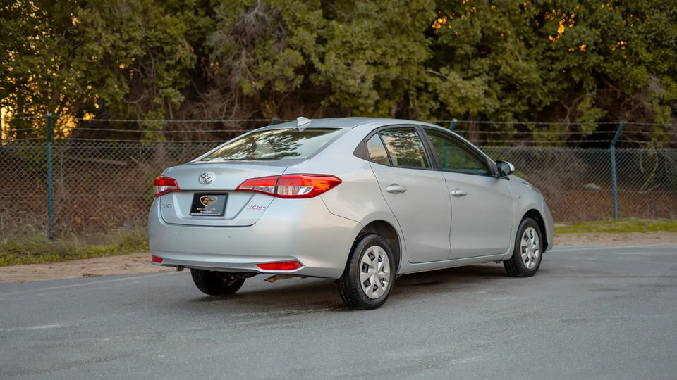 Used 2022 Toyota Yaris E in Silver – Right Back Diagonal (45°) View for Sale at First Choice Cars Dubai Sharjah