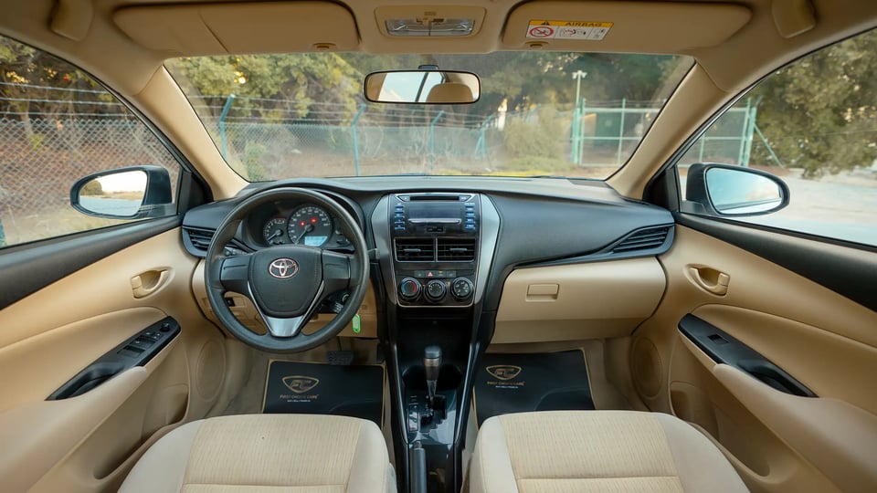 Used 2022 Toyota Yaris E in Silver – Front Cabin / Dashboard Full View for Sale at First Choice Cars Dubai Sharjah