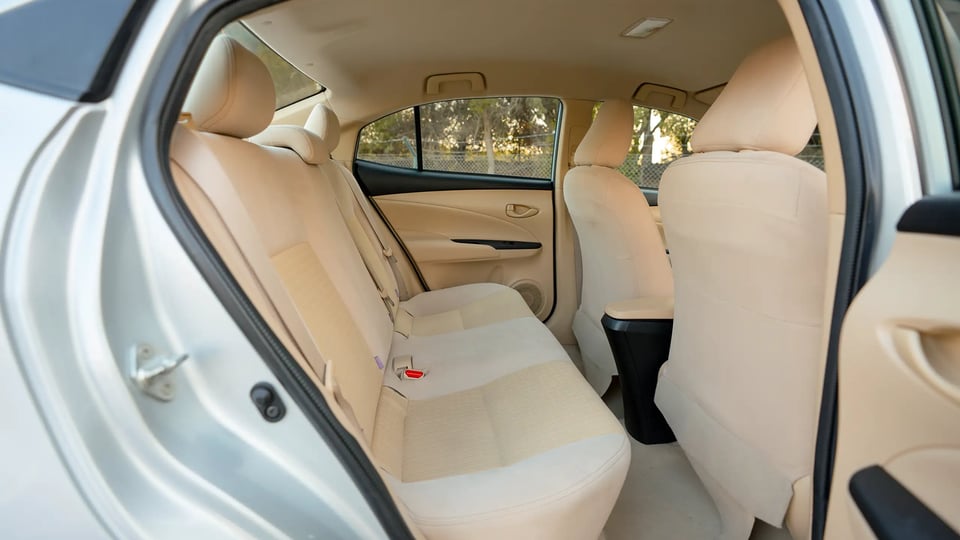 Used 2022 Toyota Yaris E in Silver – Rear Passenger Side Cabin View for Sale at First Choice Cars Dubai Sharjah