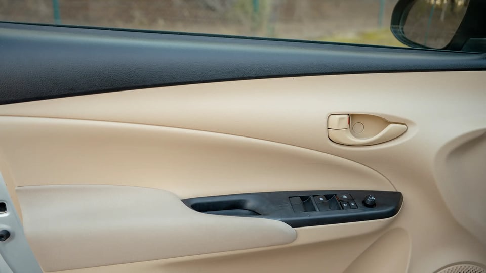 Used 2022 Toyota Yaris E in Silver – Driver Door Panel Full View for Sale at First Choice Cars Dubai Sharjah