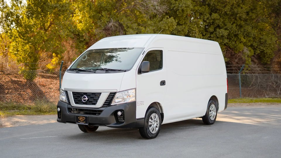 Used 2022 Nissan Urvan High Roof in White – Left Front Diagonal (45°) View for Sale at First Choice Cars Dubai Sharjah
