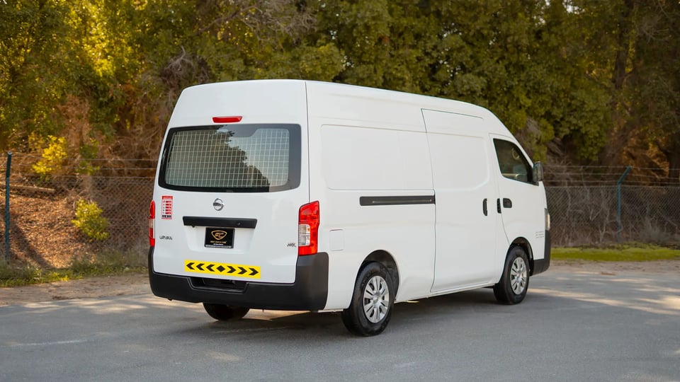 Used 2022 Nissan Urvan High Roof in White – Right Back Diagonal (45°) View for Sale at First Choice Cars Dubai Sharjah