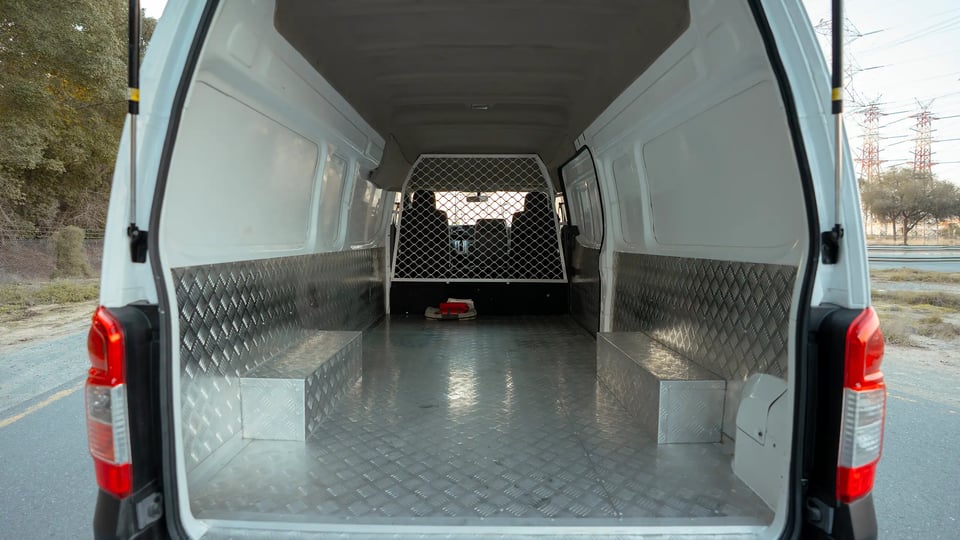 Used 2022 Nissan Urvan High Roof in White – Delivery Box Rear Opening View for Sale at First Choice Cars Dubai Sharjah