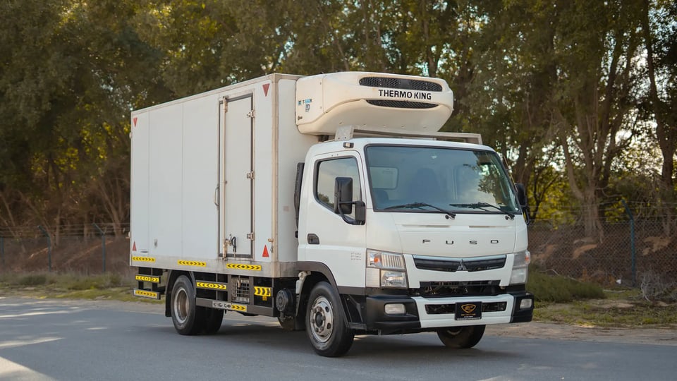 Used 2020 Mitsubishi Canter Chiller Box in White – Right Front Diagonal (45°) View for Sale at First Choice Cars Dubai Sharjah