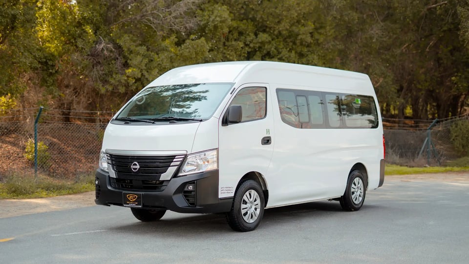 Used 2024 Nissan Urvan High Roof White – Left Front Diagonal (45°) View at First Choice Cars Sharjah