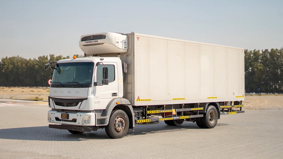 Used 2020 Mitsubishi Fuso FJ Freezer Box in White – Left Front Diagonal (45°) View for Sale at First Choice Cars Dubai Sharjah