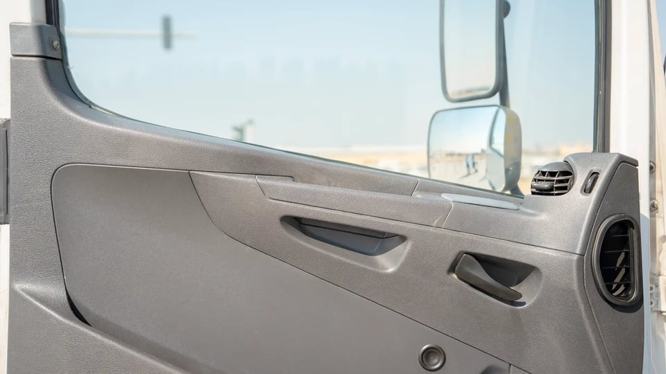 Used 2020 Mitsubishi Fuso FJ Freezer Box in White – Driver Door Panel Full View for Sale at First Choice Cars Dubai Sharjah