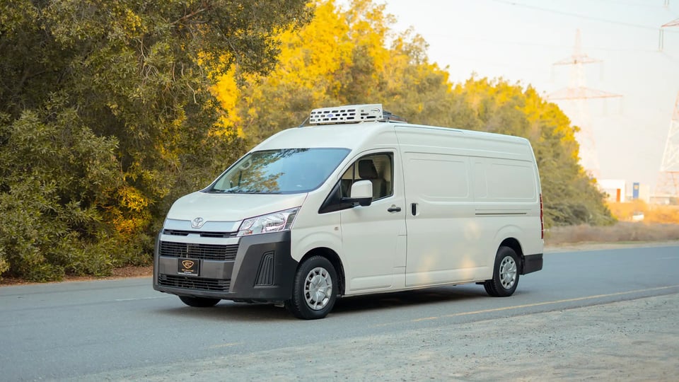 Used 2020 Toyota Hiace GL High Roof in White – Left Front Diagonal (45°) View for Sale at First Choice Cars Dubai Sharjah