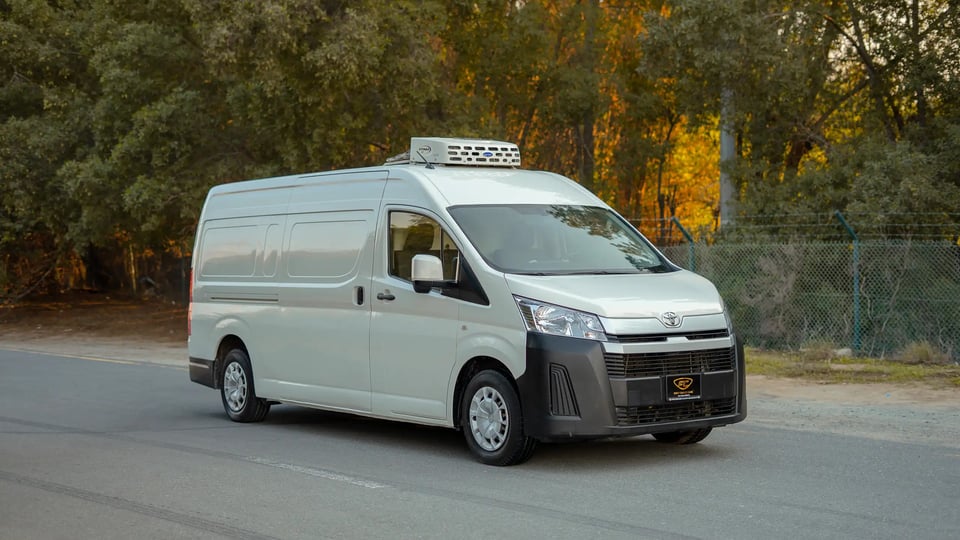 Used 2020 Toyota Hiace GL High Roof in White – Right Front Diagonal (45°) View for Sale at First Choice Cars Dubai Sharjah