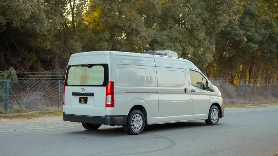 Used 2020 Toyota Hiace GL High Roof in White – Right Back Diagonal (45°) View for Sale at First Choice Cars Dubai Sharjah