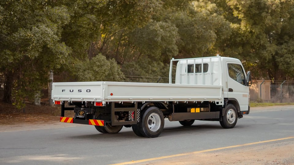 Used 2017 Mitsubishi Canter Cargo Body in White – Right Back Diagonal (45°) View for Sale at First Choice Cars Dubai Sharjah