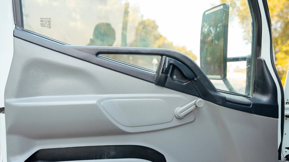 Used 2017 Mitsubishi Canter Cargo Body in White – Driver Door Panel Full View for Sale at First Choice Cars Dubai Sharjah