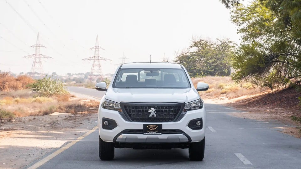 Used 2023 Peugeot Landtrek Double Cabin in White – Front View for Sale at First Choice Cars Dubai Sharjah