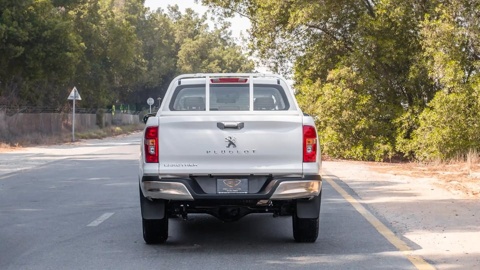 Used 2023 Peugeot Landtrek Double Cabin in White – Back/Rear View for Sale at First Choice Cars Dubai Sharjah
