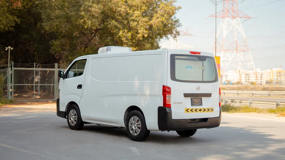 Used 2020 Nissan Urvan Standard Roof in White – Left Back Diagonal (45°) View for Sale at First Choice Cars Dubai Sharjah