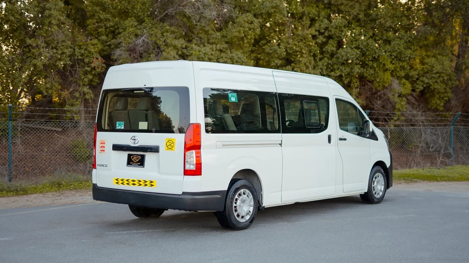 Used 2021 Toyota Hiace GL High Roof in White – Right Back Diagonal (45°) View for Sale at First Choice Cars Dubai Sharjah