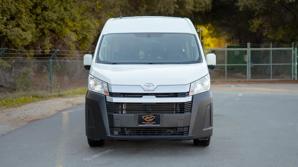 Used 2021 Toyota Hiace GL High Roof in White – Front View for Sale at First Choice Cars Dubai Sharjah