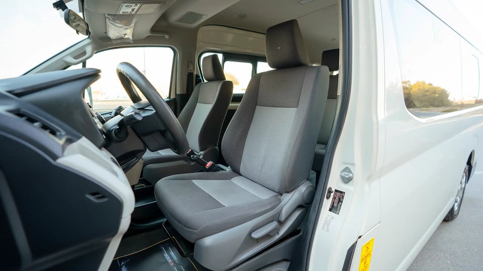 Used 2021 Toyota Hiace GL High Roof in White – Front Driver Side Cabin View for Sale at First Choice Cars Dubai Sharjah