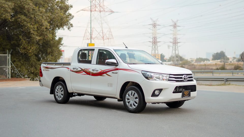 Used 2021 Toyota Hilux GLX Double Cabin in White – Right Front Diagonal (45°) View for Sale at First Choice Cars Dubai Sharjah