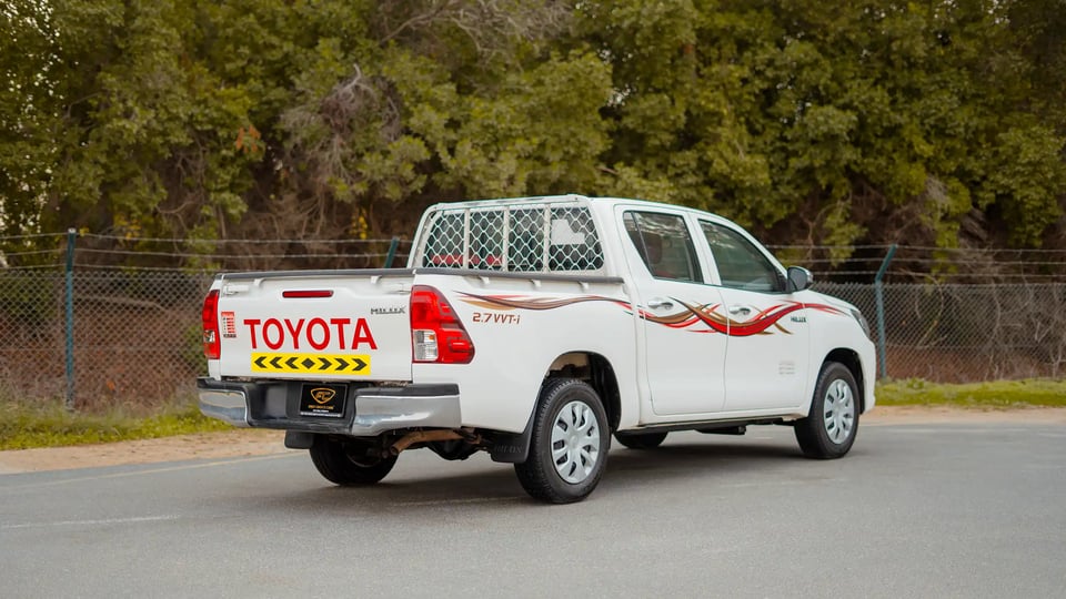 Used 2021 Toyota Hilux GLX Double Cabin in White – Right Back Diagonal (45°) View for Sale at First Choice Cars Dubai Sharjah
