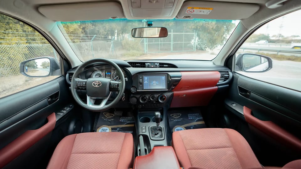 Used 2021 Toyota Hilux GLX Double Cabin in White – Front Cabin / Dashboard Full View for Sale at First Choice Cars Dubai Sharjah