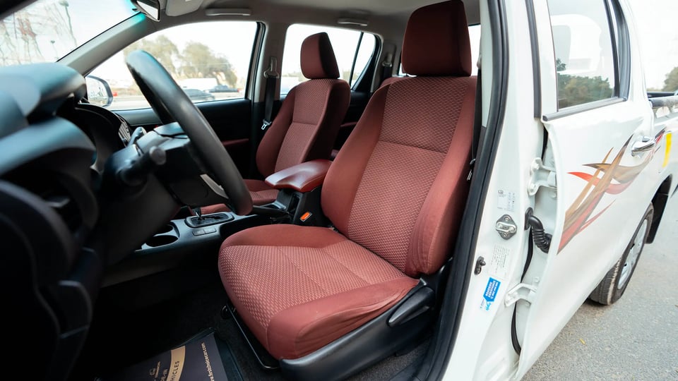 Used 2021 Toyota Hilux GLX Double Cabin in White – Front Driver Side Cabin View for Sale at First Choice Cars Dubai Sharjah