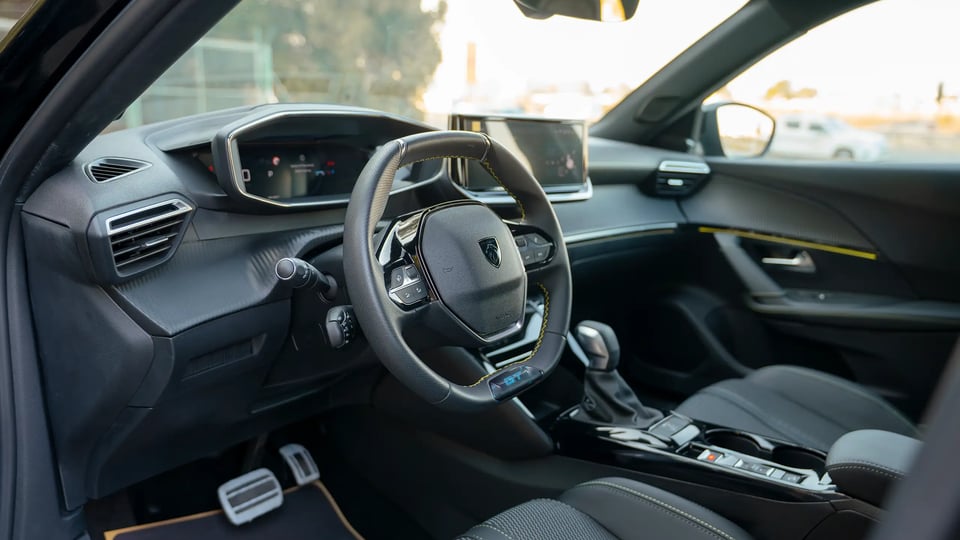 Used 2024 Peugeot 2008 GT in Black – Driver Side Dashboard & Steering View for Sale at First Choice Cars Dubai Sharjah