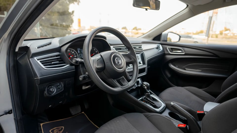 Used 2022 MG 5 Comfort in Silver – Driver Side Dashboard & Steering View for Sale at First Choice Cars Dubai Sharjah