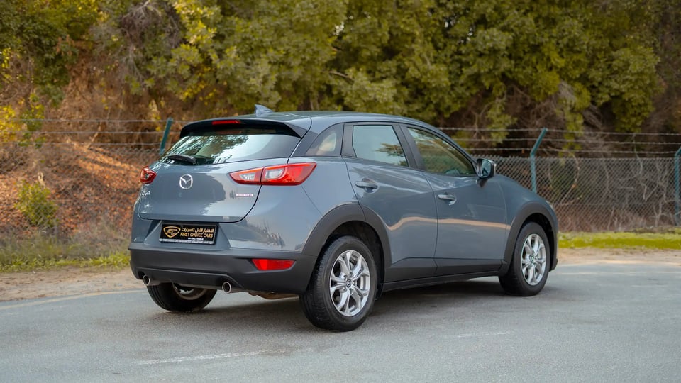 Used 2023 Mazda CX-3 GS in Blue – Right Back Diagonal (45°) View for Sale at First Choice Cars Dubai Sharjah