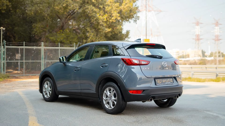 Used 2023 Mazda CX-3 GS in Blue – Left Back Diagonal (45°) View for Sale at First Choice Cars Dubai Sharjah