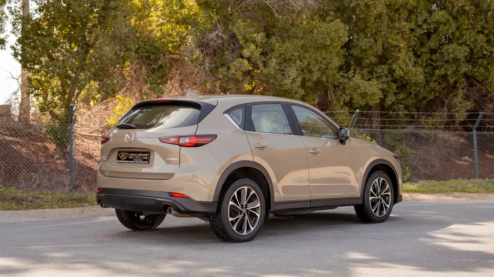 Used 2023 Mazda CX-5 GT in Gold – Right Back Diagonal (45°) View for Sale at First Choice Cars Dubai Sharjah