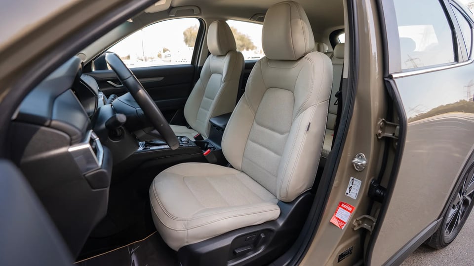 Used 2023 Mazda CX-5 GT in Gold – Front Driver Side Cabin View for Sale at First Choice Cars Dubai Sharjah