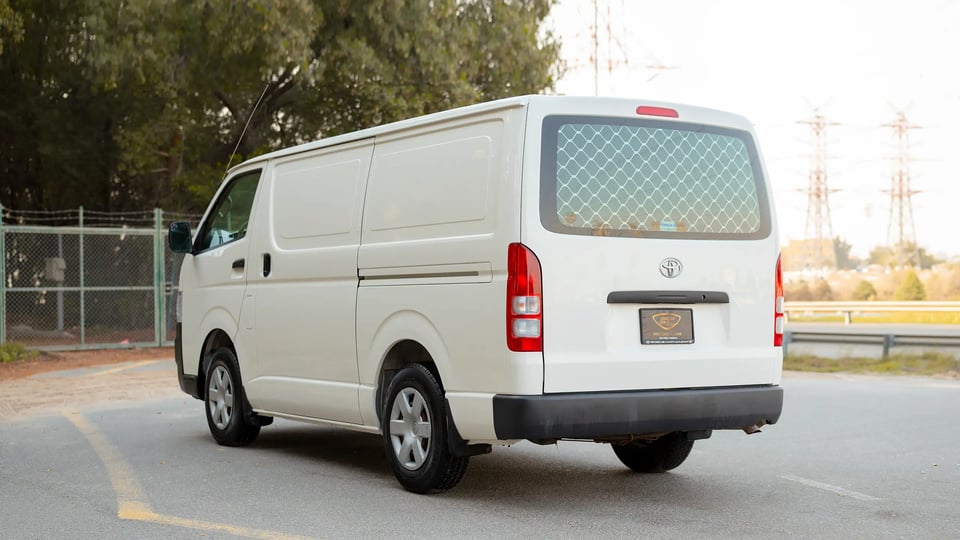 Used 2009 Toyota Hiace GL Standard Roof in White – Left Back Diagonal (45°) View for Sale at First Choice Cars Dubai Sharjah
