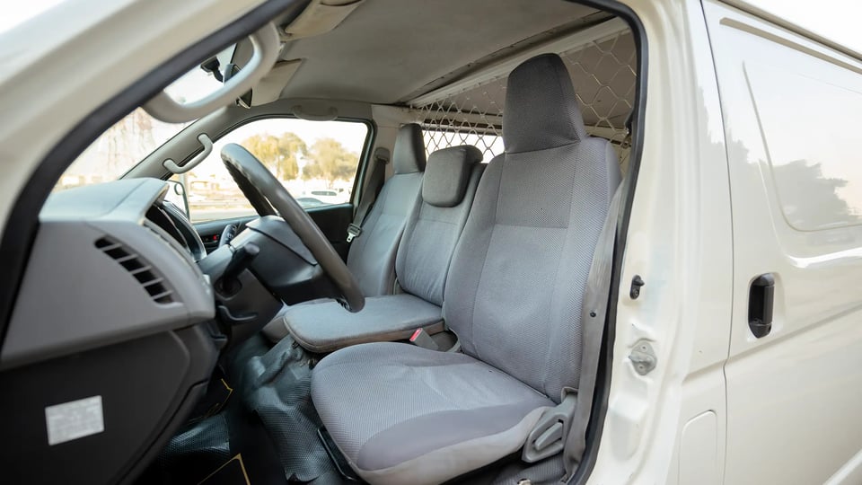 Used 2009 Toyota Hiace GL Standard Roof in White – Front Driver Side Cabin View for Sale at First Choice Cars Dubai Sharjah