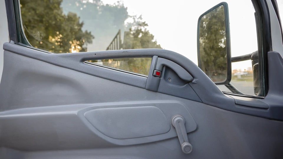 Used 2006 Mitsubishi Canter Double Cabin Cargo Body in White – Driver Door Panel Full View for Sale at First Choice Cars Dubai Sharjah