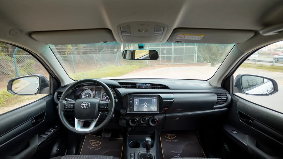 Used 2021 Toyota Hilux GLX Double Cabin in White – Front Cabin / Dashboard Full View for Sale at First Choice Cars Dubai Sharjah