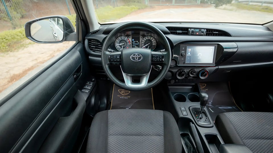 Used 2021 Toyota Hilux GLX Double Cabin in White – Steering Wheel & Instrument Cluster for Sale at First Choice Cars Dubai Sharjah