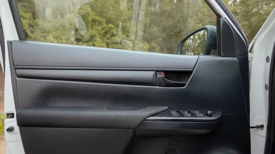 Used 2021 Toyota Hilux GLX Double Cabin in White – Driver Door Panel Full View for Sale at First Choice Cars Dubai Sharjah